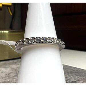 Ring Bomb Party Ring, NWOT, size 7, clear stones on silver color band